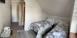 pokój z dwoma łóżkami w willi anna w gródku nad dunajcem